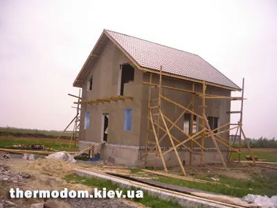 Фасад, обклеєний сіткою й загрунтований